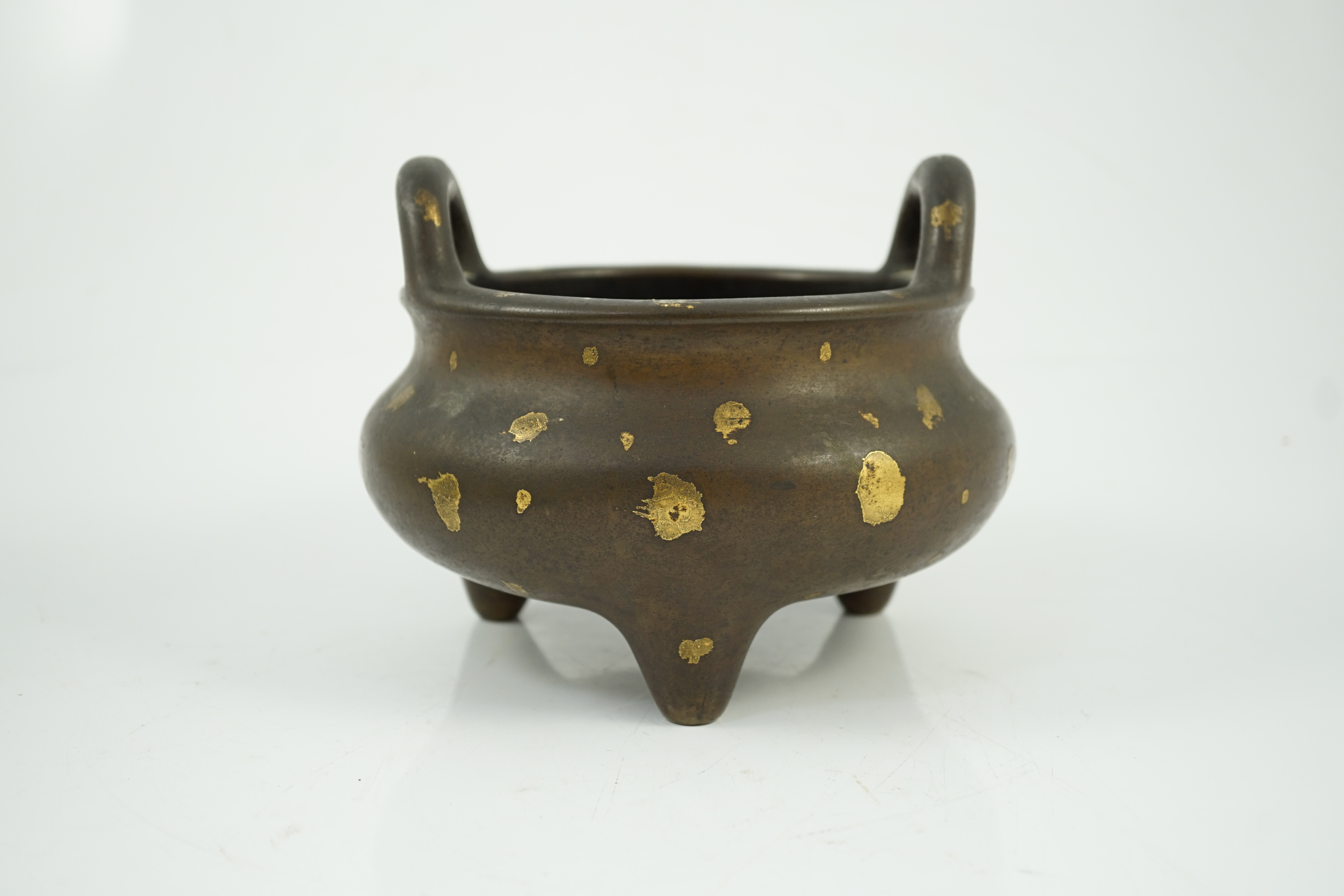 A large Chinese gold-splashed bronze tripod censer, ding, Kangxi period